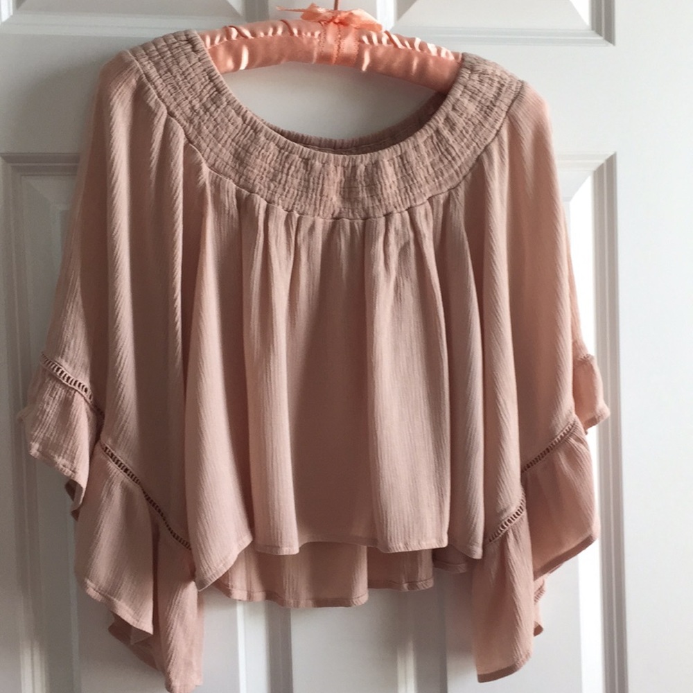 Romantic on or off the shoulder blush top